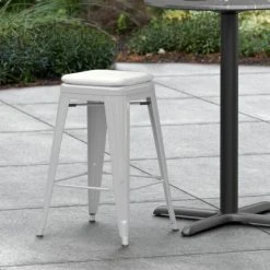 Cheap 💯 LT&S Alloy Series Lancaster Table & Seating Alloy Series Silver Stackable Metal Indoor / Outdoor Industrial Cafe Counter Height Stool With Gray Fabric Magnetic Cushion 💯