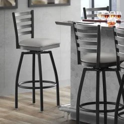 Brand new 👍 Lancaster Table & Seating Black Ladder Back Swivel Bar Height Chair With Light Gray Padded Seat 🤩