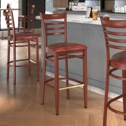 Brand new 😀 LT&S Spartan Series Lancaster Table & Seating Spartan Series Bar Height Metal Ladder Back Chair With Mahogany Wood Grain Finish And Burgundy Vinyl Seat 🔔