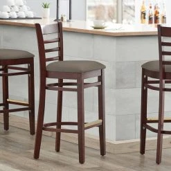Best deal 🧨 Lancaster Table & Seating Mahogany Finish Wooden Ladder Back Bar Height Chair With Taupe Padded Seat ❤️