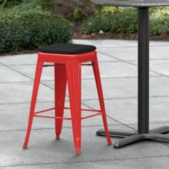 New 🔥 LT&S Alloy Series Lancaster Table & Seating Alloy Series Red Stackable Metal Indoor / Outdoor Industrial Cafe Counter Height Stool With Black Fabric Magnetic Cushion ⭐