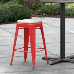 Best Sale ✔️ LT&S Alloy Series Lancaster Table & Seating Alloy Series Red Stackable Metal Indoor / Outdoor Industrial Cafe Counter Height Stool With Tan Fabric Magnetic Cushion ✨