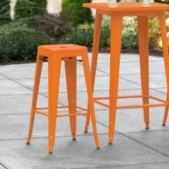 Top 10 😍 LT&S Alloy Series Lancaster Table & Seating Alloy Series Orange Stackable Metal Indoor / Outdoor Industrial Barstool With Drain Hole Seat 💯