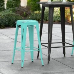 Hot Sale 💯 LT&S Alloy Series Lancaster Table & Seating Alloy Series Distressed Seafoam Stackable Metal Indoor / Outdoor Industrial Barstool With Drain Hole Seat 🔥