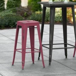 Best Sale 👍 LT&S Alloy Series Lancaster Table & Seating Alloy Series Distressed Sangria Stackable Metal Indoor / Outdoor Industrial Barstool With Drain Hole Seat 🥰