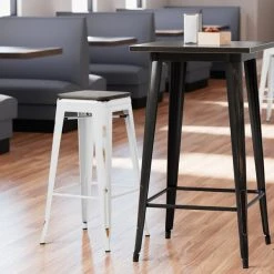 Outlet 👍 LT&S Alloy Series Lancaster Table & Seating Alloy Series Distressed White Stackable Metal Indoor Industrial Barstool With Black Wood Seat ⌛