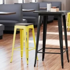 Brand new ⭐ LT&S Alloy Series Lancaster Table & Seating Alloy Series Distressed Yellow Stackable Metal Indoor Industrial Barstool With Black Wood Seat 👍
