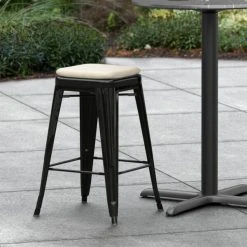 Coupon 😉 LT&S Alloy Series Lancaster Table & Seating Alloy Series Black Stackable Metal Indoor / Outdoor Industrial Cafe Counter Height Stool With Tan Fabric Magnetic Cushion ⌛