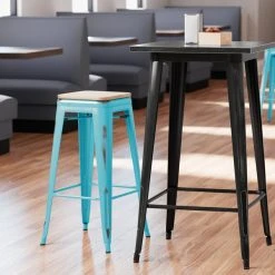Budget ⌛ LT&S Alloy Series Lancaster Table & Seating Alloy Series Distressed Arctic Blue Stackable Metal Indoor Industrial Barstool With Natural Wood Seat 🛒